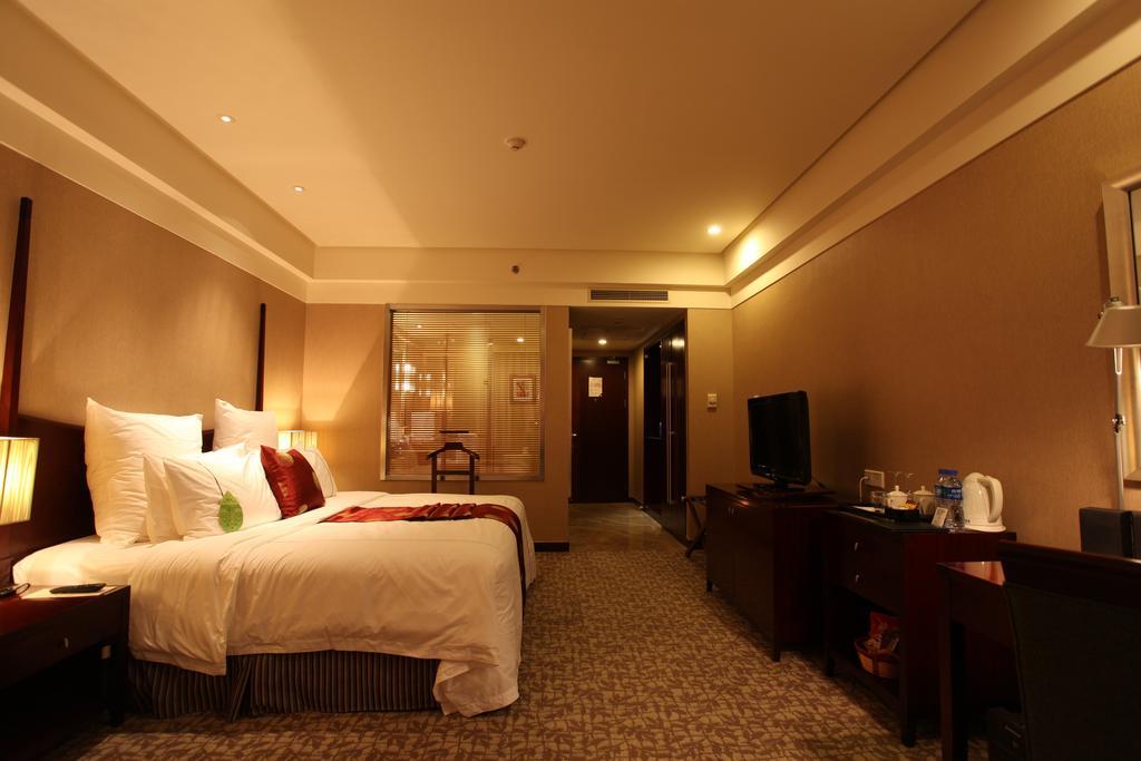 Ruiwan New Century Hotel Тяньцзинь Номер фото